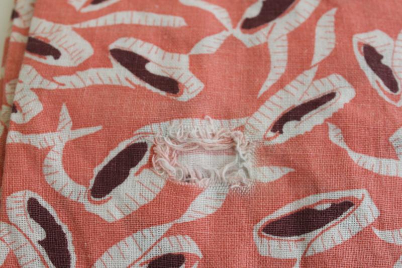 vintage print cotton feedsack fabric, coral pink w/ sewing tape measures