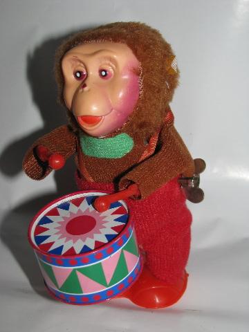 vintage reproduction tin toys, wind-up monkeys musical band
