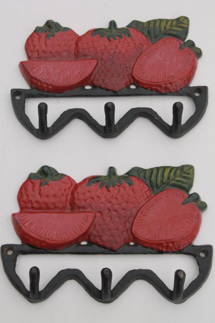 vintage style new cast iron wall mount hooks, red painted strawberries for a country kitchen