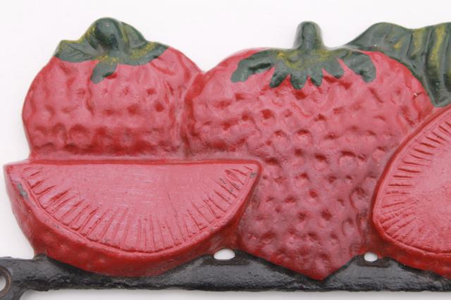 vintage style new cast iron wall mount hooks, red painted strawberries for a country kitchen