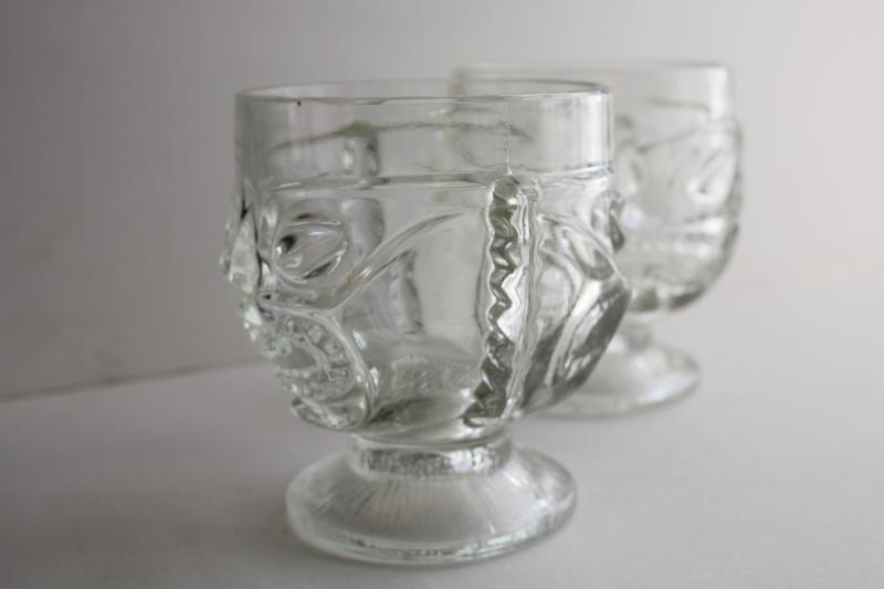 vintage tiki cups, large heavy clear glass heads for vases, candle holders, drinking glasses