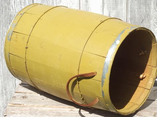 vintage  wood barrel, wooden nail keg in primitive old mustard paint