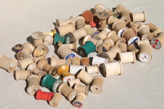 vintage wooden spools w/ some old labels, old sewing thread spools, primitive wood spool lot