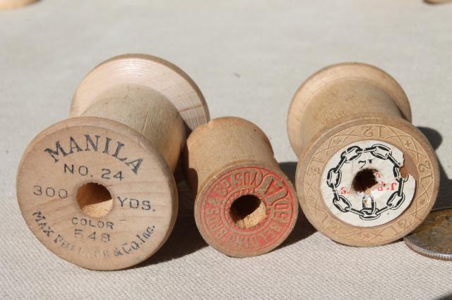 vintage wooden spools w/ some old labels, old sewing thread spools, primitive wood spool lot