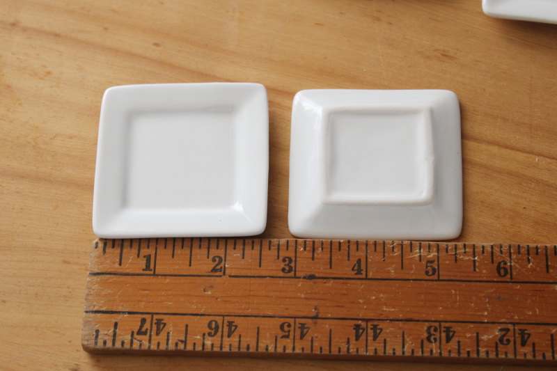 white ceramic tasting plates, tiny butter pat size china dishes, stackable square shape
