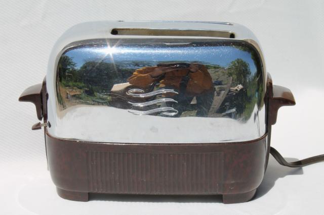 working 1950s vintage GE two slice toaster, brown bakelite & shiny silver chrome
