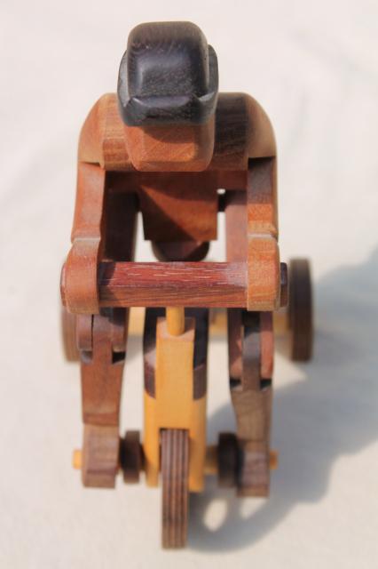 working tricycle wooden toy, handmade wood folk art whimsy, man on wheels
