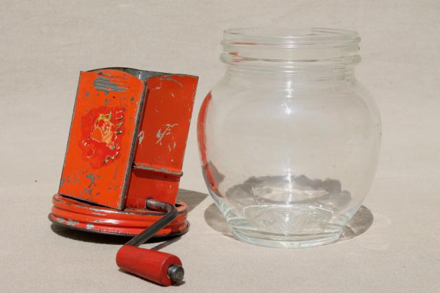 1930s vintage nut grinder, old red paint metal hand crank nut crusher w/ glass jar