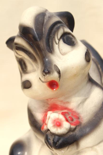 1940s vintage carnival chalkware bank, Flower the skunk painted plaster figure