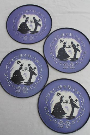 1940s vintage round metal serving trays, silhouettes print in black on lavender