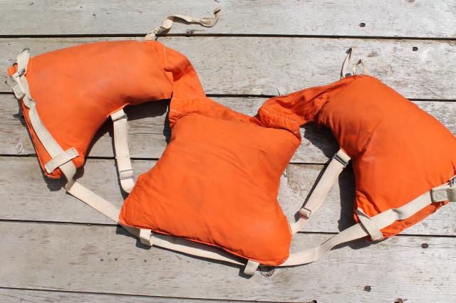 1950s vintage life preserver buoyant vest, kapok fill orange cotton life jacket