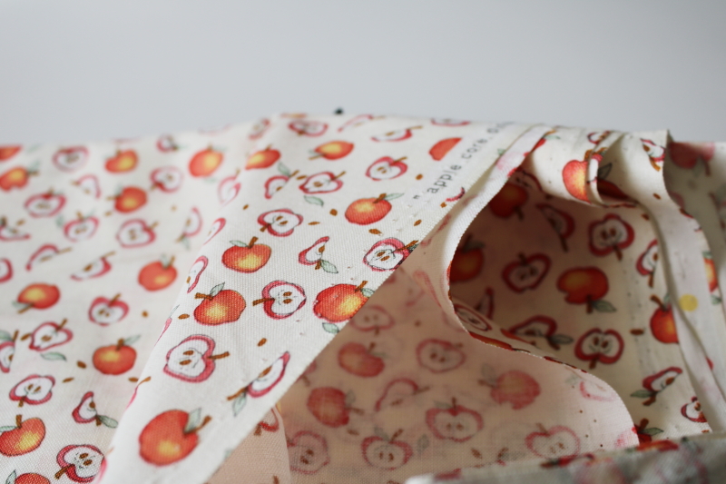 1990s vintage cotton fabric, whimsical apples  apple cores print