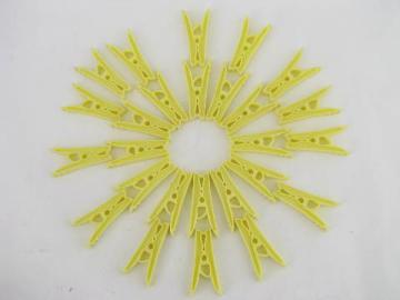 60s vintage yellow plastic spring clip clothespins, never used