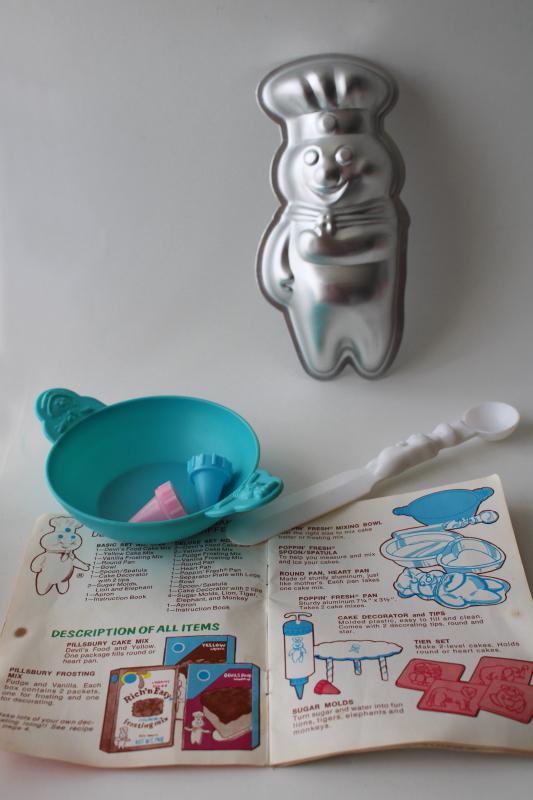 70s vintage Pillsbury doughboy cake baking pan, toy kitchen utensils, cookbook