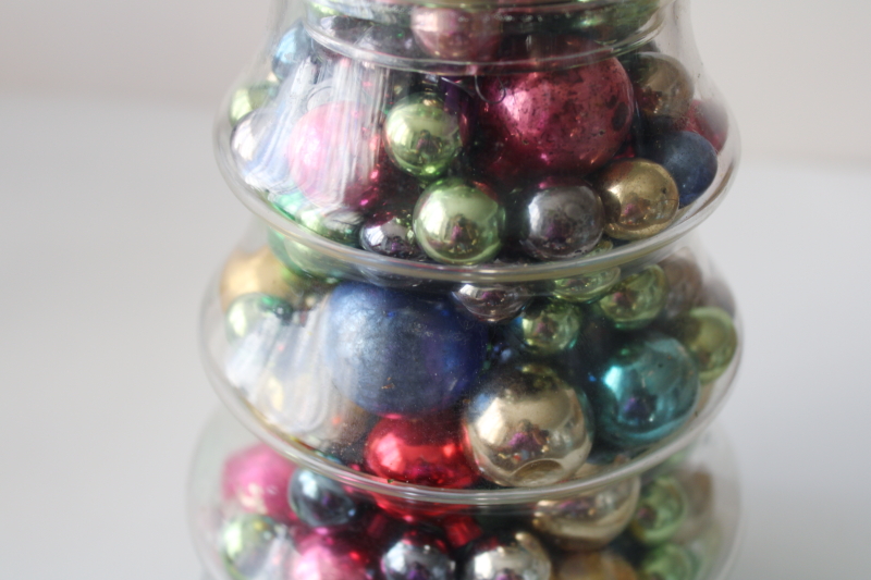 Christmas tree glass apothecary candy jar full of vintage ornaments, mini glass balls