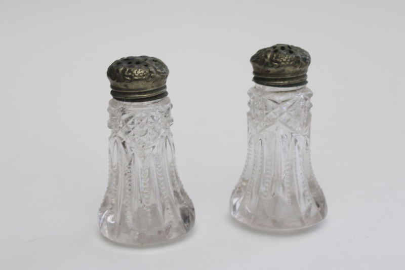 EAPG pressed glass salt  pepper shakers cut rib  hobstar pattern, worn ornate lids