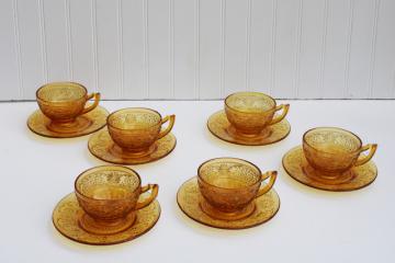 Indiana daisy pattern vintage glass cups  saucers set for 6, dark amber depression glass