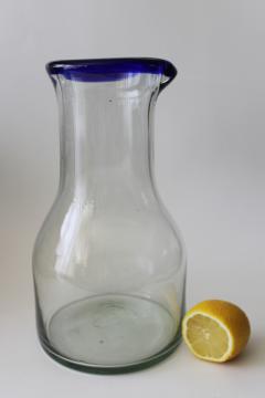 Mexican hand blown glass carafe pitcher, bottle shape blue band rim vintage glassware