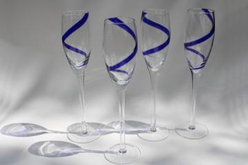 Pier 1 swirline champagne flutes, cobalt blue swirl hand blown glass stemware
