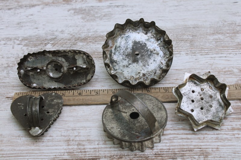 Primitive style vintage tin cookie cutters, fluted round circles, oval, star, heart shapes