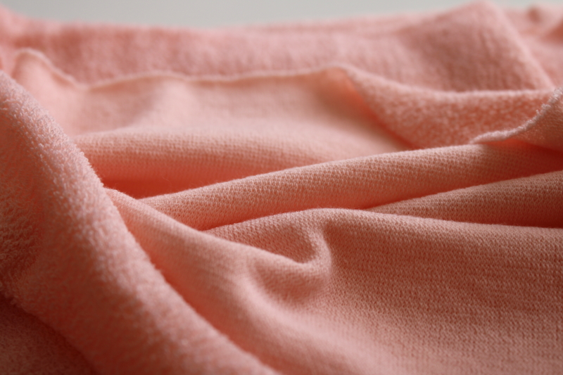 Retro vintage poly knit fabric w/ super soft terry texture, blush pink color