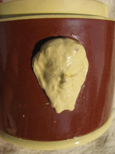 Sarreguemines french majolica pottery, old yellow / mocha lidded jar w/ face handles