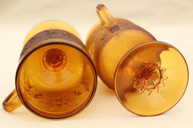 amber glass sandwich daisy pattern footed tall cups, vintage Tiara / Indiana glass