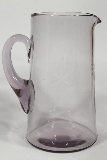 antique Bethlehem star six pointed stars wheel cut etched glass pitcher, sun purple lavender color