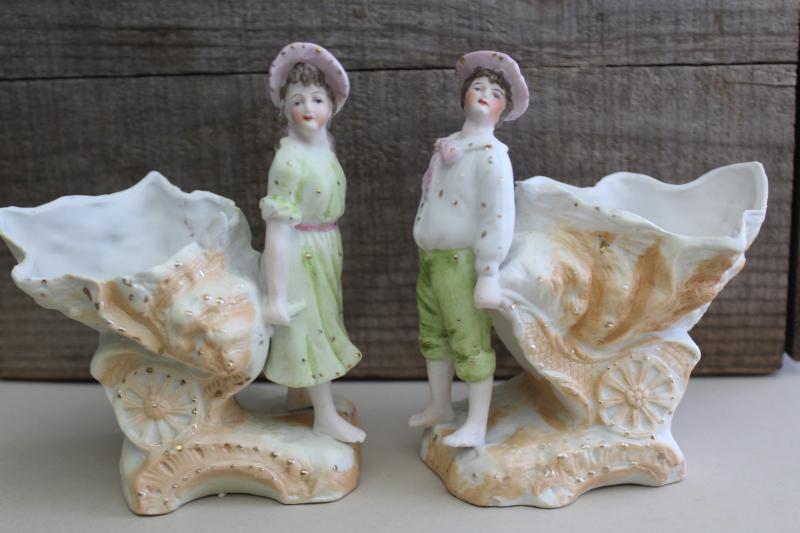antique German bisque china figurines, art nouveau couple, boy & girl w/ sea shell carts