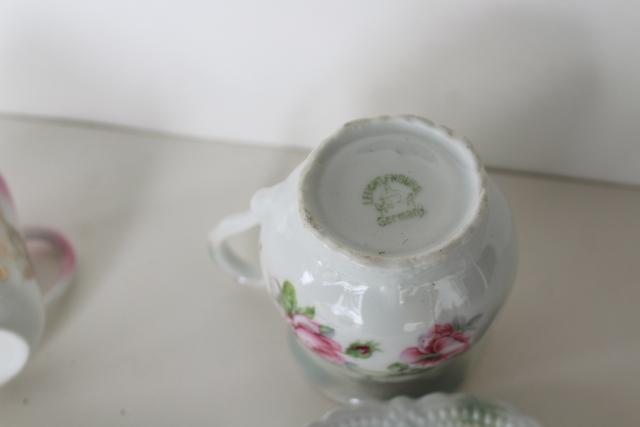 antique German china demitasse cups & saucers, A Present motto hand painted luster roses
