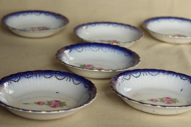 antique Limoges China, flow blue border w/ rose pink floral, American or French?