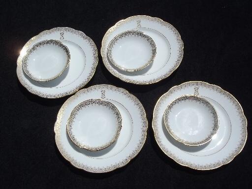 antique Limoges china bread plates and butter pats, white w/ gold S monogram