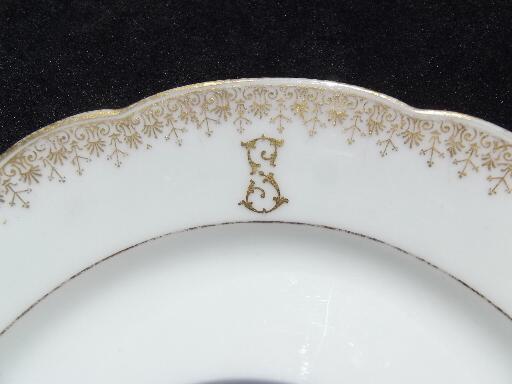 antique Limoges china bread plates and butter pats, white w/ gold S monogram