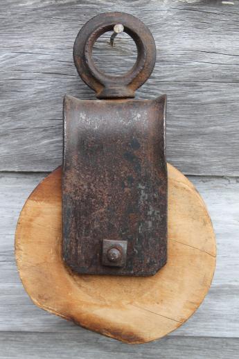 squared off antique wooden barn pulley 