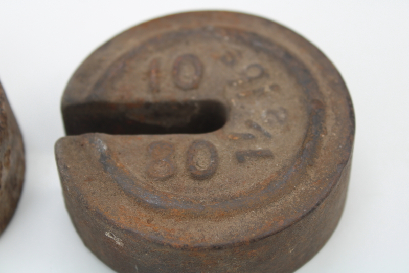 antique cast iron scale weights, large round weights rusty crusty vintage farm primitives