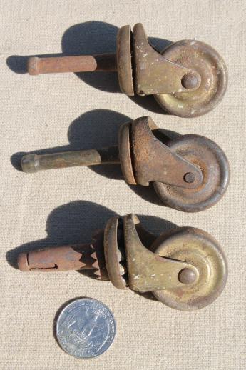 antique furniture casters w/ steel wheels, assorted rusty old metal wheels vintage hardware