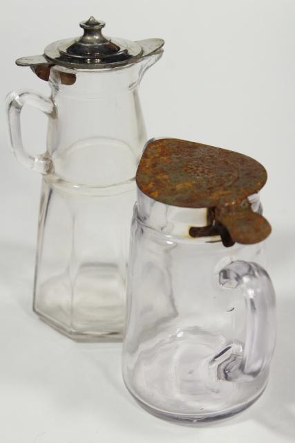 antique glass syrup pitchers w/ metal lids, turn of the century vintage glassware