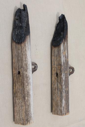 antique horse harness hooks on salvage barn wood, rustic architectural hardware