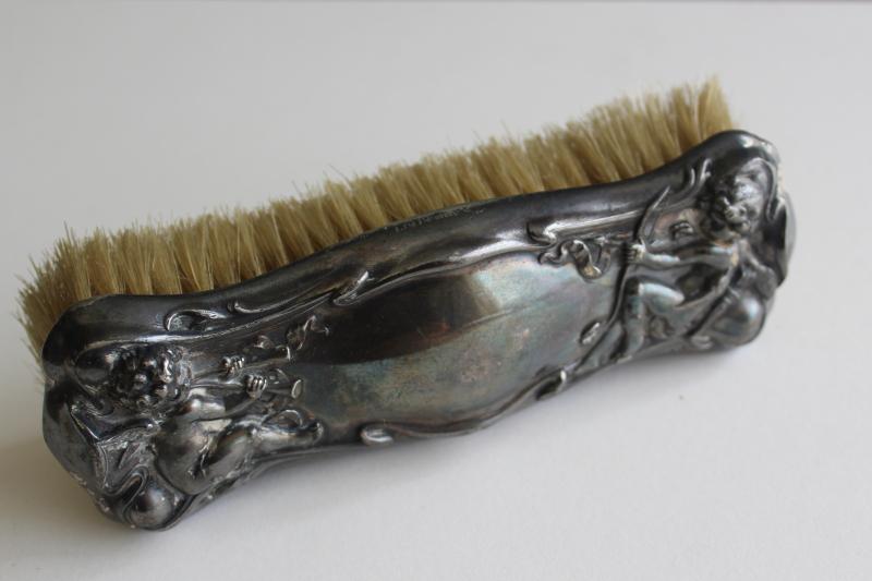 antique horsehair clothes brush, ornate silver plate w/ cherubs, vanity set brush