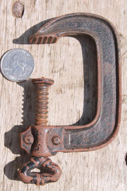 antique industrial tool woodworking or machinist's clamps, iron skeleton key turn screw clamps