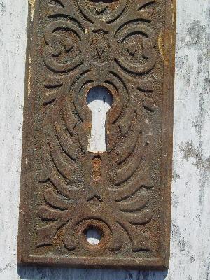 antique ornate arts and crafts doorknob plates