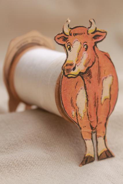 antique paper trade card Coats & Clark sewing thread advertising, toy cow  to make w/ spool