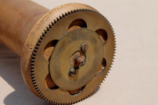 antique player piano roller, large wooden spool to hold paper piano rolls