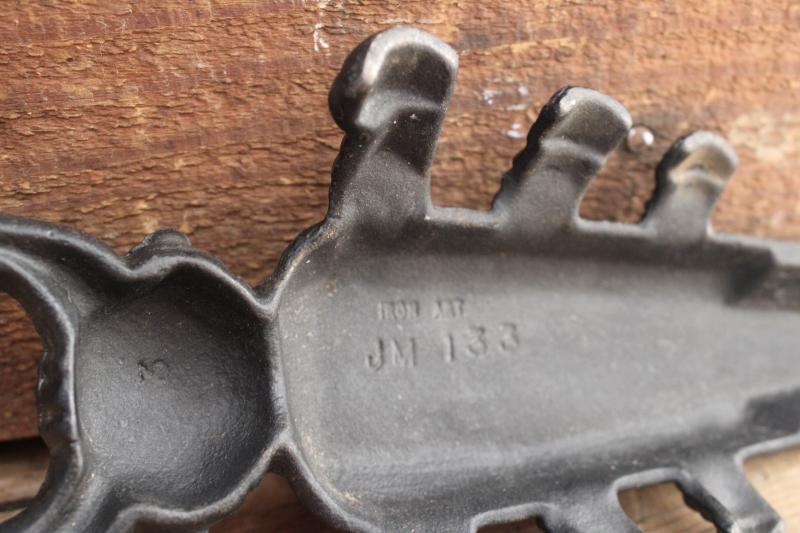 antique reproduction cast iron beetle boot jack, vintage Iron Art bootjack 