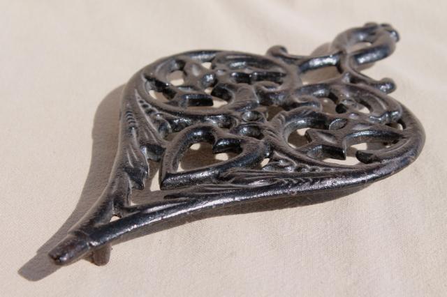 antique reproduction cast iron trivet collection, John Wright / Wilton Wrightsville trivets