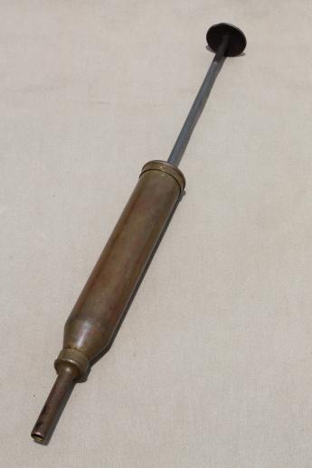 antique solid brass grease gun, early automobile mechanic's  oiling & greasing tool