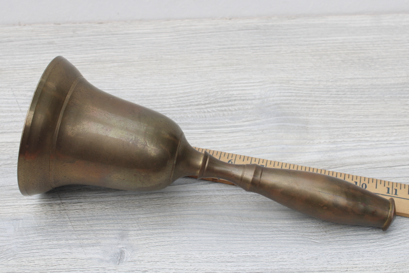 big solid brass hand bell, old fashioned school bell for teachers desk