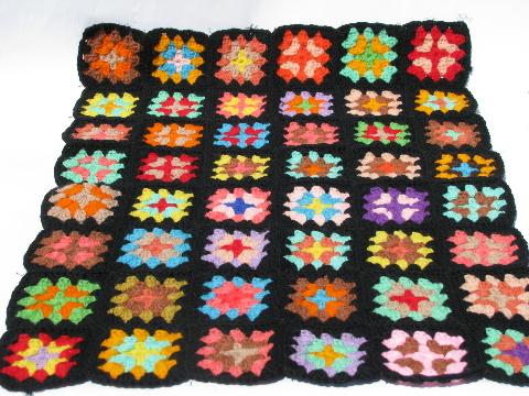 black w/ brights granny squares, small child's doll size crocheted afghan, 1940s vintage