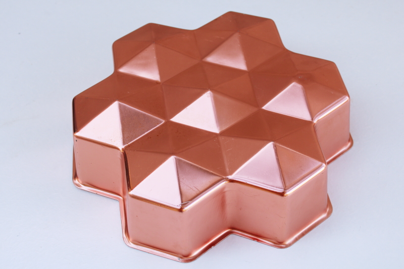 https://laurelleaffarm.com/item-photos/bright-copper-color-vintage-aluminum-mold-jeweled-gem-shape-jello-mold-or-baking-pan-Laurel-Leaf-Farm-item-no-rg1020129-1.jpg