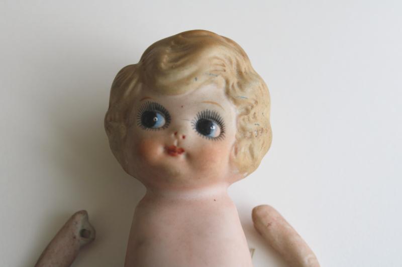 broken googly doll, vintage Japan china doll w/ waved bob and big wide ey